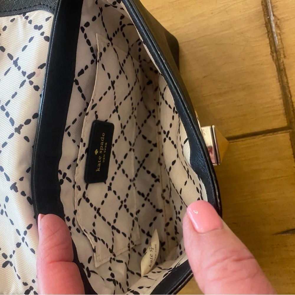 Kate Spade Newbury Lane Sally Black Leather Turn Lock Crossbody Bag gently used